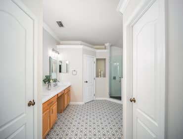 Woodland Hills Master Bathroom Remodel – Double Vanity and Modern Flooring