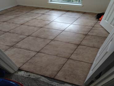 Rowlett, Texas Demo 1000 sq ft of carpet and vinyl plank floor and installation of 1000 sq ft of ceramic tile. Painted interior walls. Design and insta
