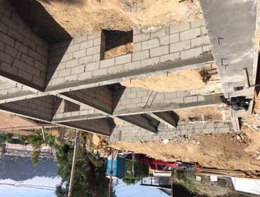 Mount Washinton Hillside land development including caissons/piles, grade beams, CMU block walls, retaining walls. All known as foundation and structur