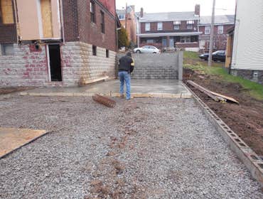 Photo(s) from Hollis Contracting Tour out the existing foundation floor and re-poured with concrete.