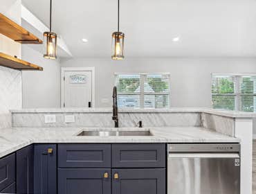 Photos by Nextden Construction #1 Full interior and exterior remodel.