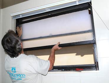 Bocaire Country Club House - Window & Door Repair Replaced balance rods in windows and added track cap to sliding glass door.