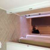 Photos by Modern Renovations #1 Tiled 1st Level with A Herringbone Pattern