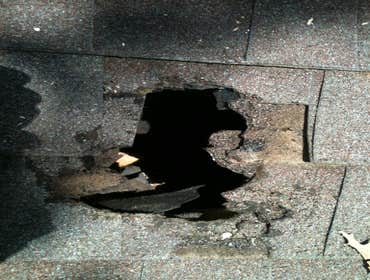 Hole in Roof from Tree Damage Big Tree limb fell and put hole in roof. Repaired hole and replaced shingles. Cleaned and repaired Gutters.