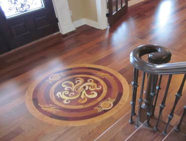 Our Showroom We have over 1500 square feet Hardwood Floors, in our showroom, to INSPIRE you. You pick your wood, custom stain color, design pattern, bo