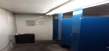 Photos by Weise Choice Construction #2 Complete remodel of industrial bathroom. Complete with floor plan change. Bathrooms were tiled and frp'd, and to