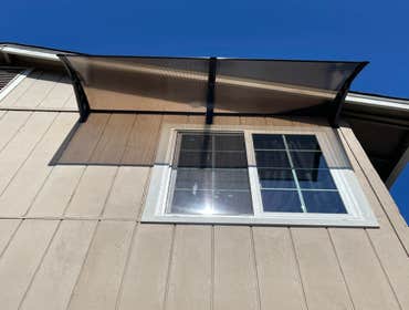 Photos by Cal Valley Landscape #3 Window replacement and awning installed