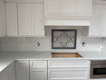 Photos by Smilenow Landscaping LLC #1 In this project, we installed custom backsplash as well as countertop installation.