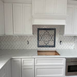 Photos by Smilenow Landscaping LLC #1 In this project, we installed custom backsplash as well as countertop installation.