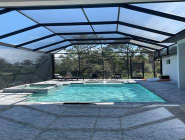 Photos by Carmody Construction Fl Inc #3 Installation of a screen cage