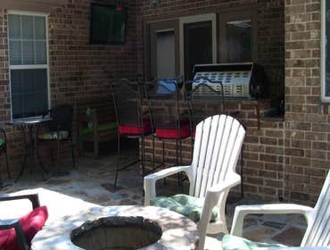 Cedar Garage Door and Backyard Kitchen