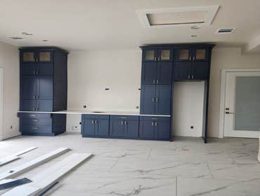 Photos by White Elephant Remodeling LLC #8 All real wood soft close cabinet's (navy gray) with custom glass doors and modifications to fit interior des