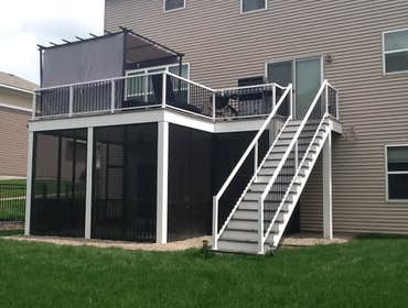 Photos by Custom Home Specialties Inc #2 Timber Tech maintenance free decks with powder coated railings.