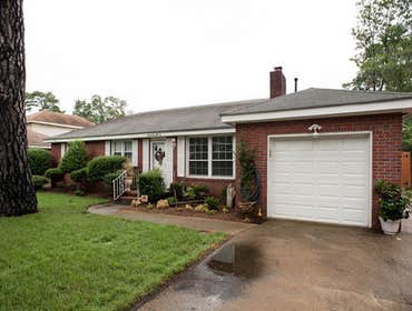 Single story brick home remodel by Caruana Homes, Inc.