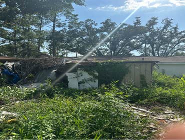 Remodel Termite Damaged Home Demolition to rear of termite damaged home. Remodel/Reframe rear of home, add new plumbing for new shower & new electrical