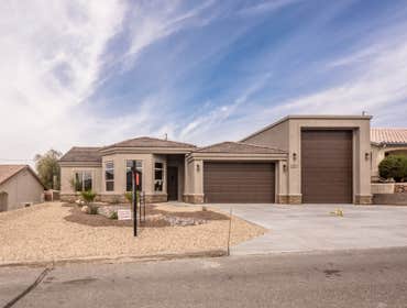 3035 Arabian Dr, Lake Havasu City Brand new home by Desert Sun Homes, with 60' deep RV garage and 13.6 door! . Great design with open floor plan, tile 
