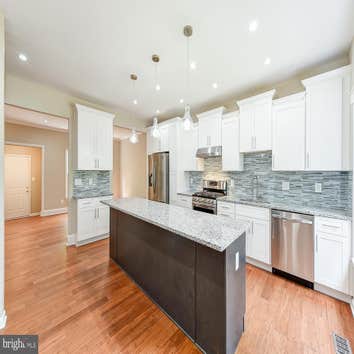 Photos by Floors Kitchen & Bath Direct Inc #1 This house needed a full remodel to be able to sell it for top dollars. Thanks to our winning formula "Sm