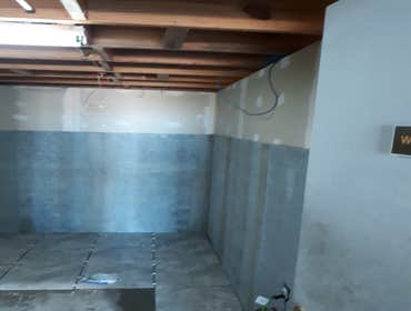 Photos by Weise Choice Construction #2 Complete remodel of industrial bathroom. Complete with floor plan change. Bathrooms were tiled and frp'd, and to
