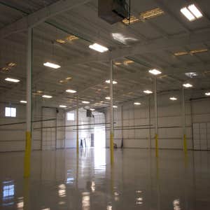 DT Old warehouse turned into production area, Installed 6 lamp T5 fixtures and power gutter.