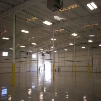 DT Old warehouse turned into production area, Installed 6 lamp T5 fixtures and power gutter.