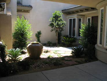Tech-Noir Landscapes, Inc. Photos This display shows an array of fire pits, water features, and barbeques that add that special touch. Hard scape photo