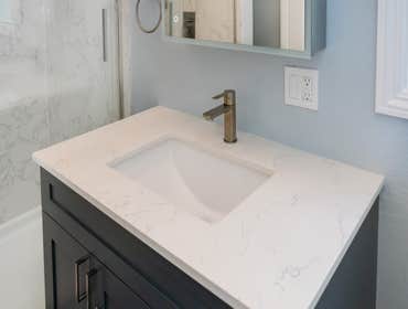 Berkeley Hill Bathroom Remodel Complete bathroom remodel. Shower has full length granite slabs.