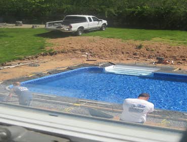 Photos by Dunn Landscape Construction #1 After initial pool installation provide all hardscape including retaining walls, pool deck, walkways and plant