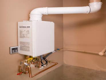Installed new tankless water heater outside to free up space