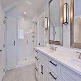 Sammamish Highlands Remodel Remodel of master suite, laundry/mudroom, guest bath, powder room, and entry. Replaced all flooring and repainted. Selected
