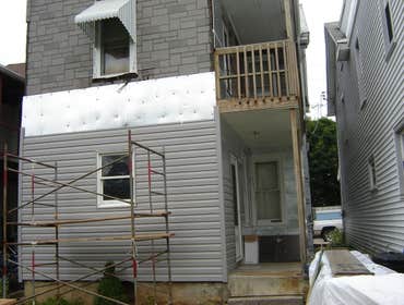 Swank Home Makeover A 2.5 story, single-family home: Siding, windows, insullation, soffit, fascia, capping. Also, repaired fence damage, installed new