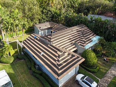 Photos by Gold Star Miami Corp #1 metal roof panels all are . 25 years warrantee