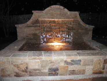 Photos by Professional Masonry (on) Pools and Ponds #1 Custom stone fountain with water feature.