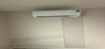 Photos by Handyman Modesto Limited Liability Company #2 Installation of a multi-zone mini-split system with 4 indoor units connected to a single outdoo