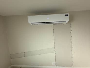 Photos by Handyman Modesto Limited Liability Company #2 Installation of a multi-zone mini-split system with 4 indoor units connected to a single outdoo