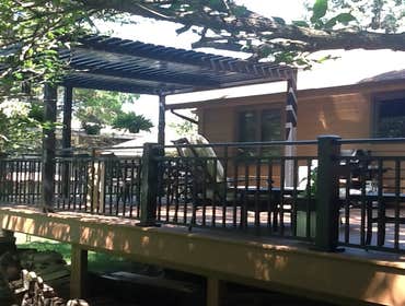 Photos by Custom Home Specialties Inc #2 Timber Tech maintenance free decks with powder coated railings.