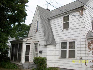 Brilliant Painting, LLC Exterior Project 1 Before and after photos of a full house that has been power washed, scraped, hand sanded, primed, and painte