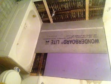 Photo(s) from Jays Carpentry And Remodeling Demo wall area around tub and replace with water resistant rock and custom tiling of shower wall and sink a