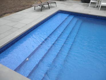 Patricks Pools Photos Patrick's Pools Inc is a swimming pool contractor serving Eastern Long Island. We specialize in elite gunite and vinyl pool insta
