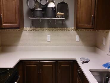 Project photos from perfection tile and stone Interior remodeling of kitchen and baths. Custom backsplash,floors,walk in showers,and tub surrounds.
