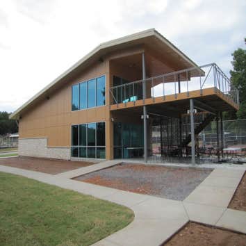 Tennis Pro Shop at Riordan Hall, Bella Vista AR This project consisted of metal stud walls, wood trusses, red iron, and a composite deck. Just about ev