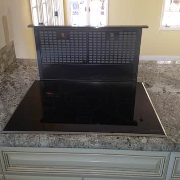 RCL Construction Company, Inc Project Tinajo Kitchen remodeling project with glazed cabinetry.
