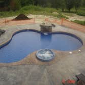 Custom in-ground pool with spa This is a beautiful pool spa combination located in a new luxury sub-division is Gretna Nebraska. This pool was built fo