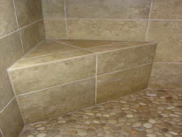 pebble floor with framed bench
