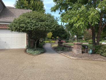 exposed aggregate Driveway Photo by Potoroka Concrete Macomb MI