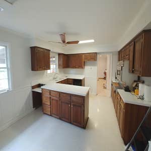 Before kitchen with wall seperating living