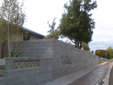 Cinder Block Walls Cinder block walls any height and length. We also can create a decorative style with stucco, smooth, rough or sandy look. We can a