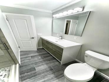 Bathroom Remodel Full Bathroom Remodel with new shower door, tile and floor tiles. Toilet, Vanity & paint.