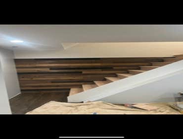 Photos by Sterling & Kole Realty LLC #2 Flooring, crown moulding, steps, post and beam, railings, banisters, wooden wall tile, install 7 doors, install