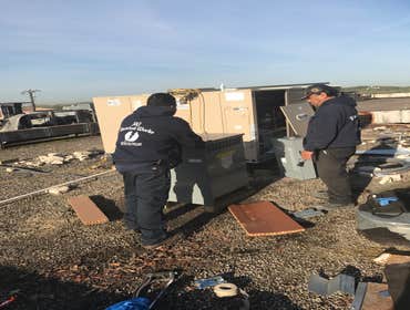 Photos by J and J Electrical Works Inc #1 Installing transformer for roof top unit.