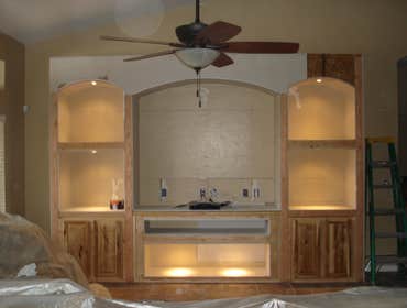 Photos from Love Remodeling Llc Built in custom entertainment center and custom oak floating shelves